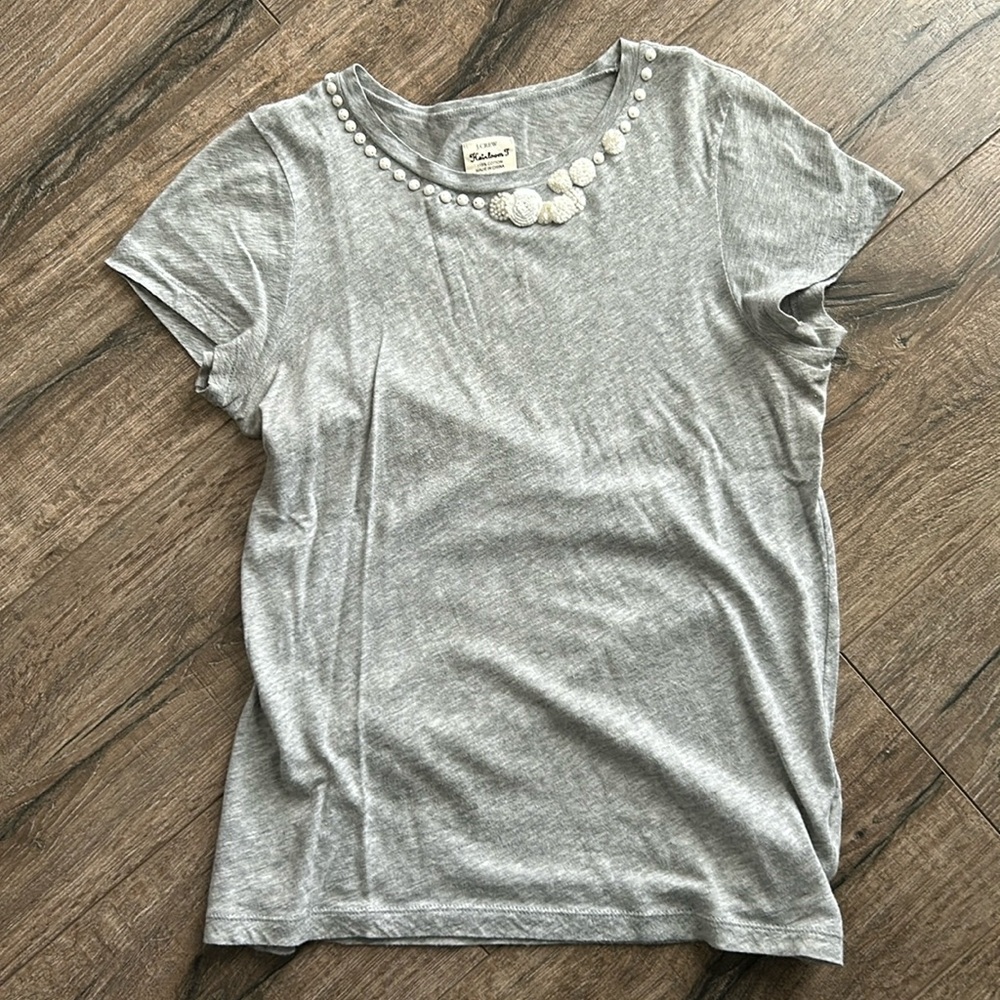 Short sleeve, thin cotton grey shirt with beaded on necklace.